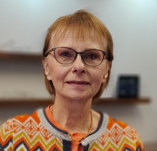 orange picture of customer wearing a stunning pair of glasses