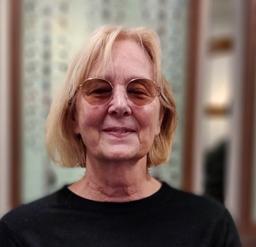 lind picture of customer wearing a stunning pair of glasses