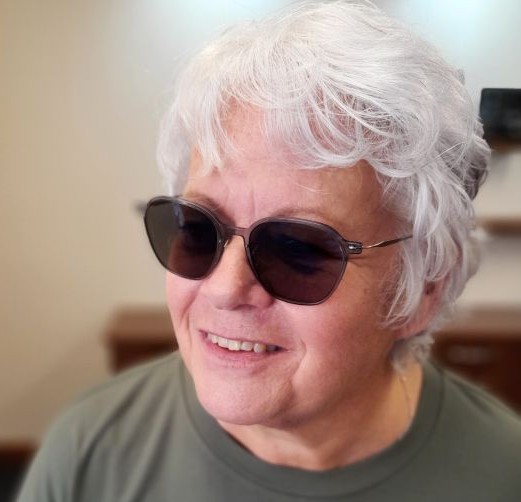 bcdfdd06-5ce8-459c-9e9a-72061d715529 (1) picture of customer wearing a stunning pair of glasses