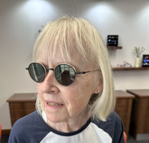 882d7d80-e4b3-4664-b610-443cdb695eb8 picture of customer wearing a stunning pair of glasses