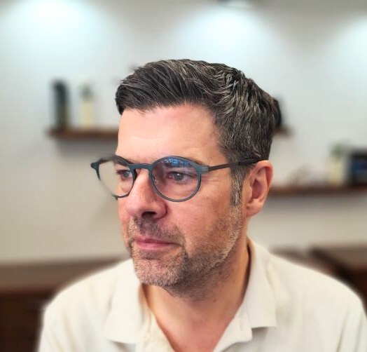 054f0742-b1b2-4c14-80de-69b36d61ae2b picture of customer wearing a stunning pair of glasses