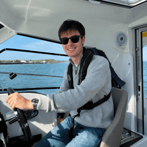 Man on a boat in sunglasses