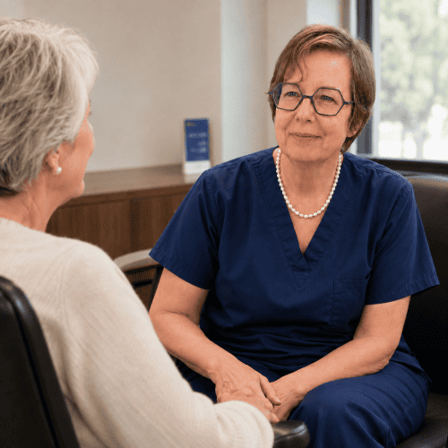 Optician Helen talking with a patient