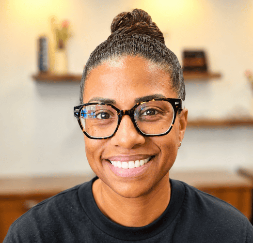 lady smiling in an Ahlem frame